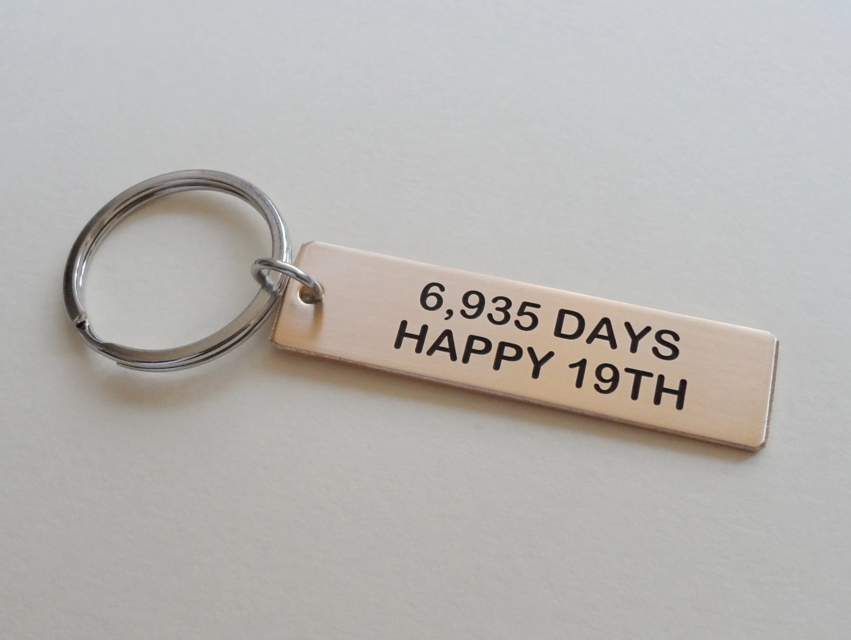 19 Year Anniversary Gift • Bronze Tag Keychain Engraved w/ "6,935 Days, Happy 19th" Handmade by Jewelry Everyday